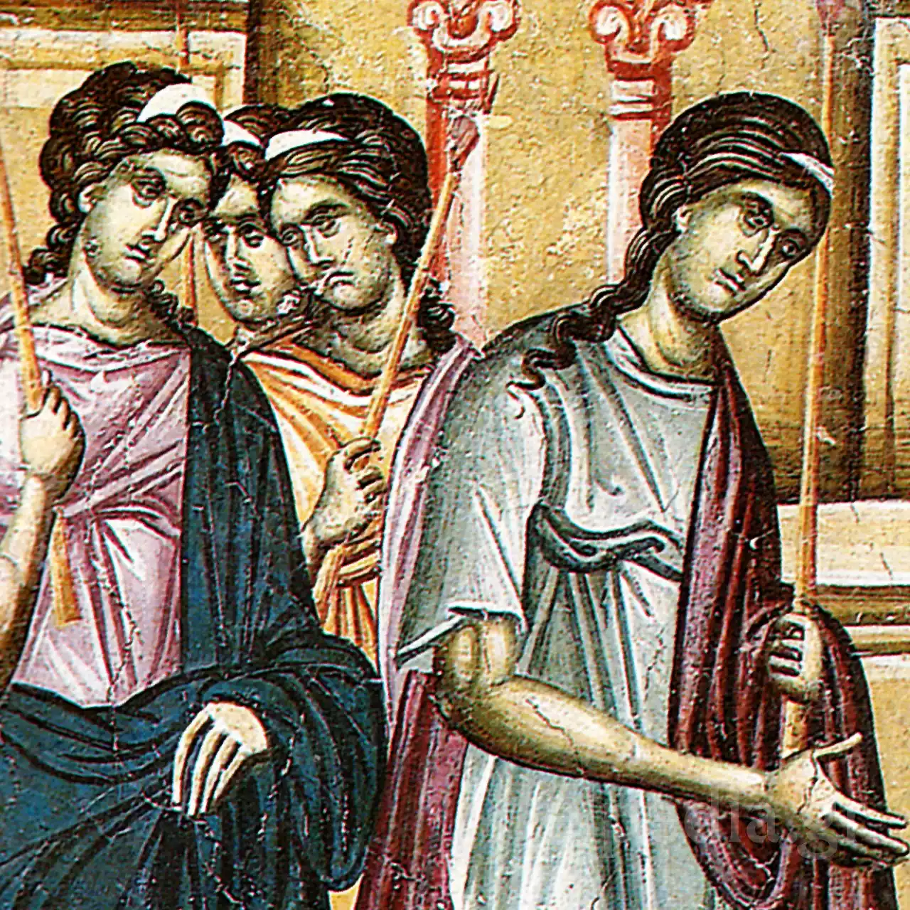 マリアを伴う処女たちが灯火を持ち、真剣な表情をしています。