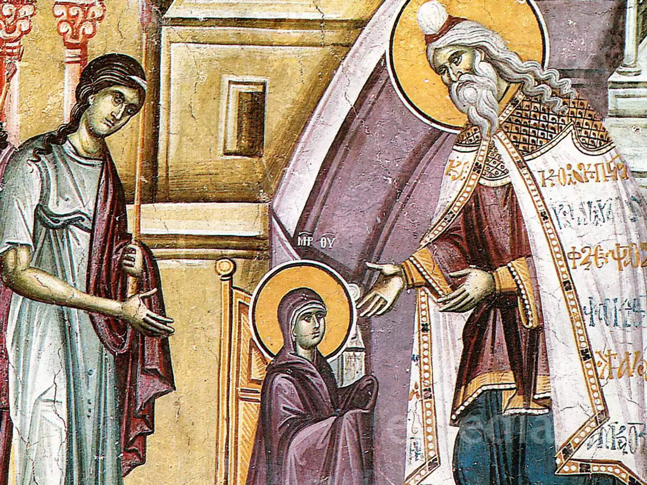 祭司ザカリアスが白い衣装でマリアに手を差し伸べています。