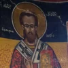 Face Detail Of Saint Abercius In A Post-Byzantine Fresco With A Cracked Halo In The Agrafa.