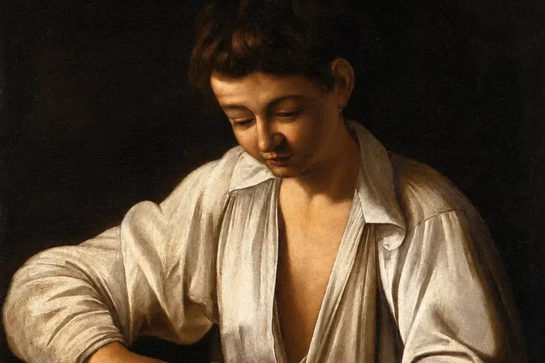 The Boy Peeling Fruit In An Early Painting By Caravaggio With A Dark Background
