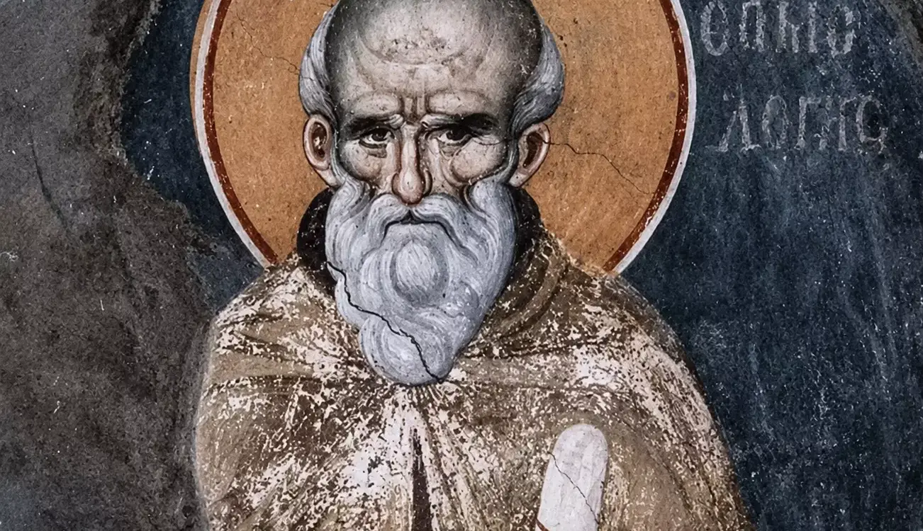 Close-Up Of The Manuel Panselinos Saint Maximus Fresco, Displaying The Aged Saint'S Lined Face And White Beard Against A Dark Background.