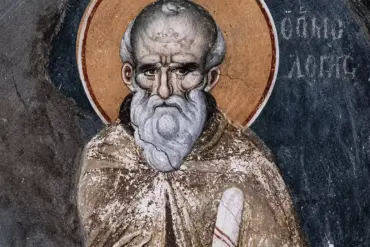 Close-Up Of The Manuel Panselinos Saint Maximus Fresco, Displaying The Aged Saint'S Lined Face And White Beard Against A Dark Background.