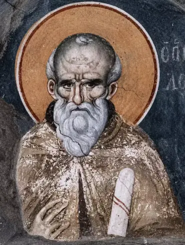 Close-Up Of The Manuel Panselinos Saint Maximus Fresco, Displaying The Aged Saint'S Lined Face And White Beard Against A Dark Background.