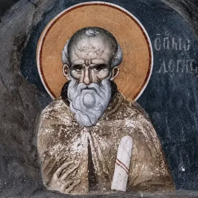 Close-Up Of The Manuel Panselinos Saint Maximus Fresco, Displaying The Aged Saint'S Lined Face And White Beard Against A Dark Background.