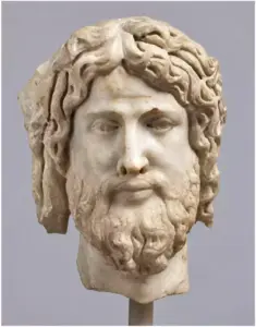 Μαρμάρινη κεφαλή με κυματιστά μαλλιά και γενειάδα, καταλογογραφημένη ως «Κεφαλή Χριστού ή Διός».